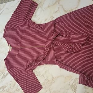 Striped front zip romper in maroon.